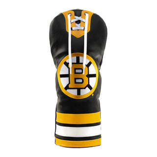 A Boston Bruins themed golf club headcover, designed to look like a hockey glove, featuring the team's logo on the front, black and yellow leather-like panels, white laces, and white and black stripes at the base, set against a plain white background.