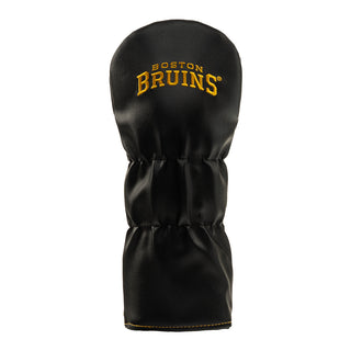 A black golf club headcover with 'BOSTON BRUINS' embroidered in gold on the front, set against a plain white background.