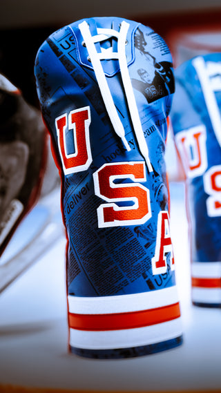 USA Hockey red, white, and blue driver golf headcover with collar laces detail.