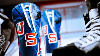 USA Hockey red, white, and blue driver golf headcover with collar laces detail.